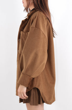 
            
                Load image into Gallery viewer, Brown geometric cord button down shacket pocket detail
            
        