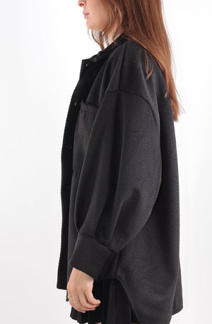 
            
                Load image into Gallery viewer, Black Geometric Cord Button Down Shacket Pocket Detail
            
        