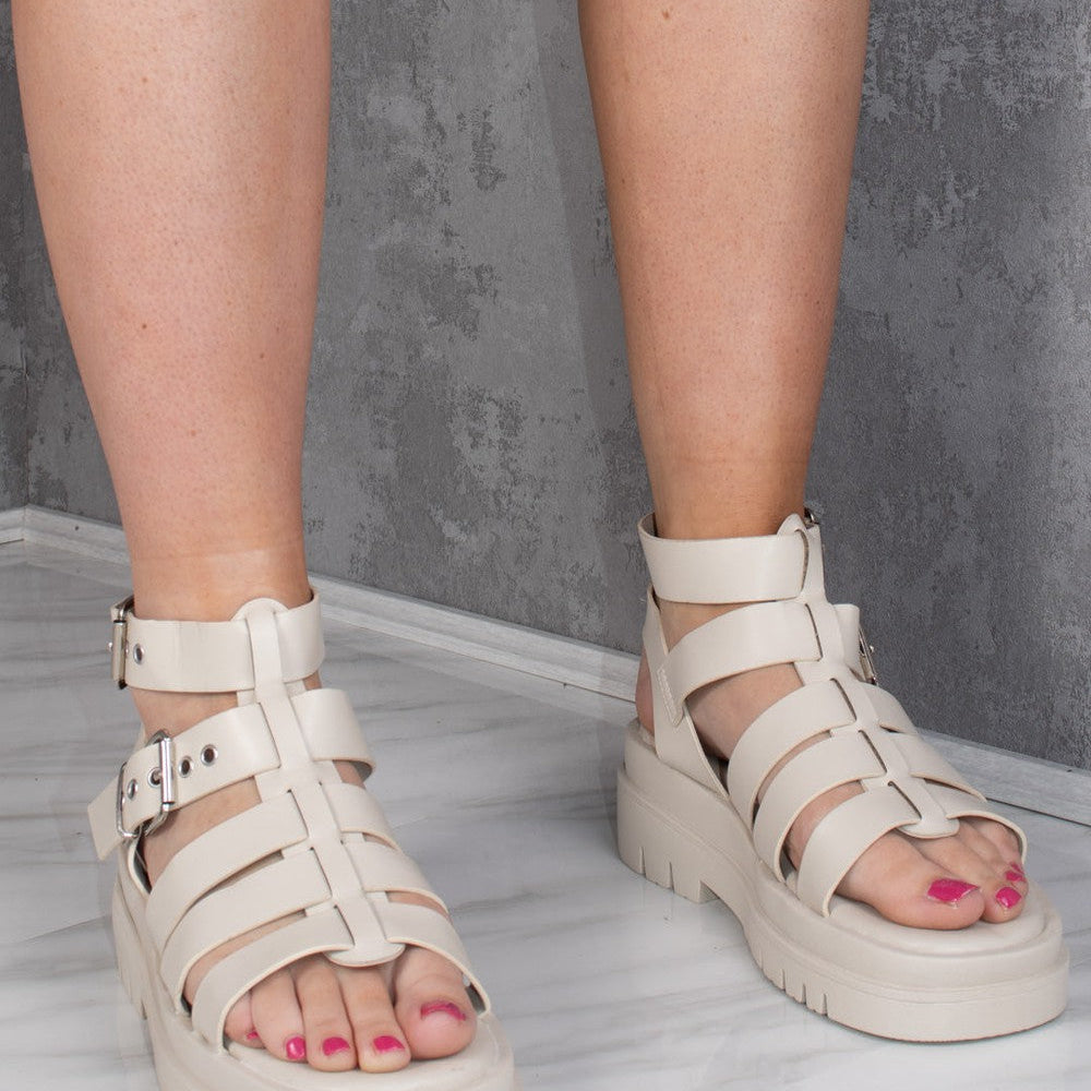 
                      
                        Beige Chunky Platform Caged Gladiator Sandal
                      
                    