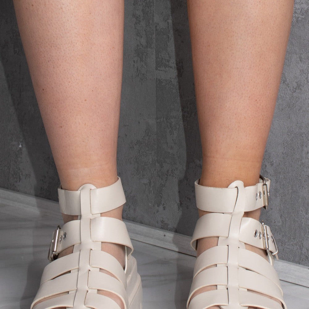 
                      
                        Beige Chunky Platform Caged Gladiator Sandal
                      
                    