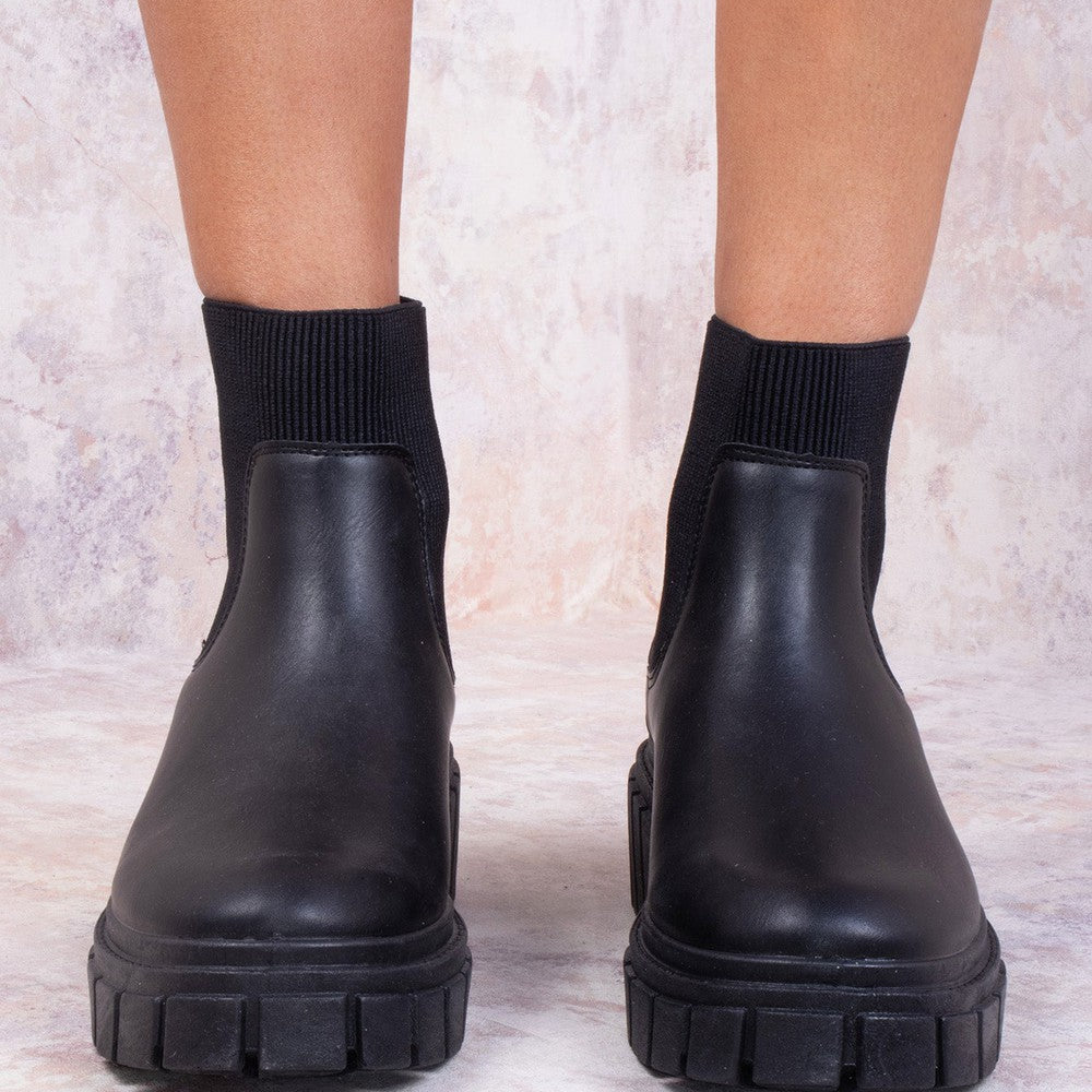 
                      
                        Black Platform Slip On Faux Leather Sock Boot
                      
                    