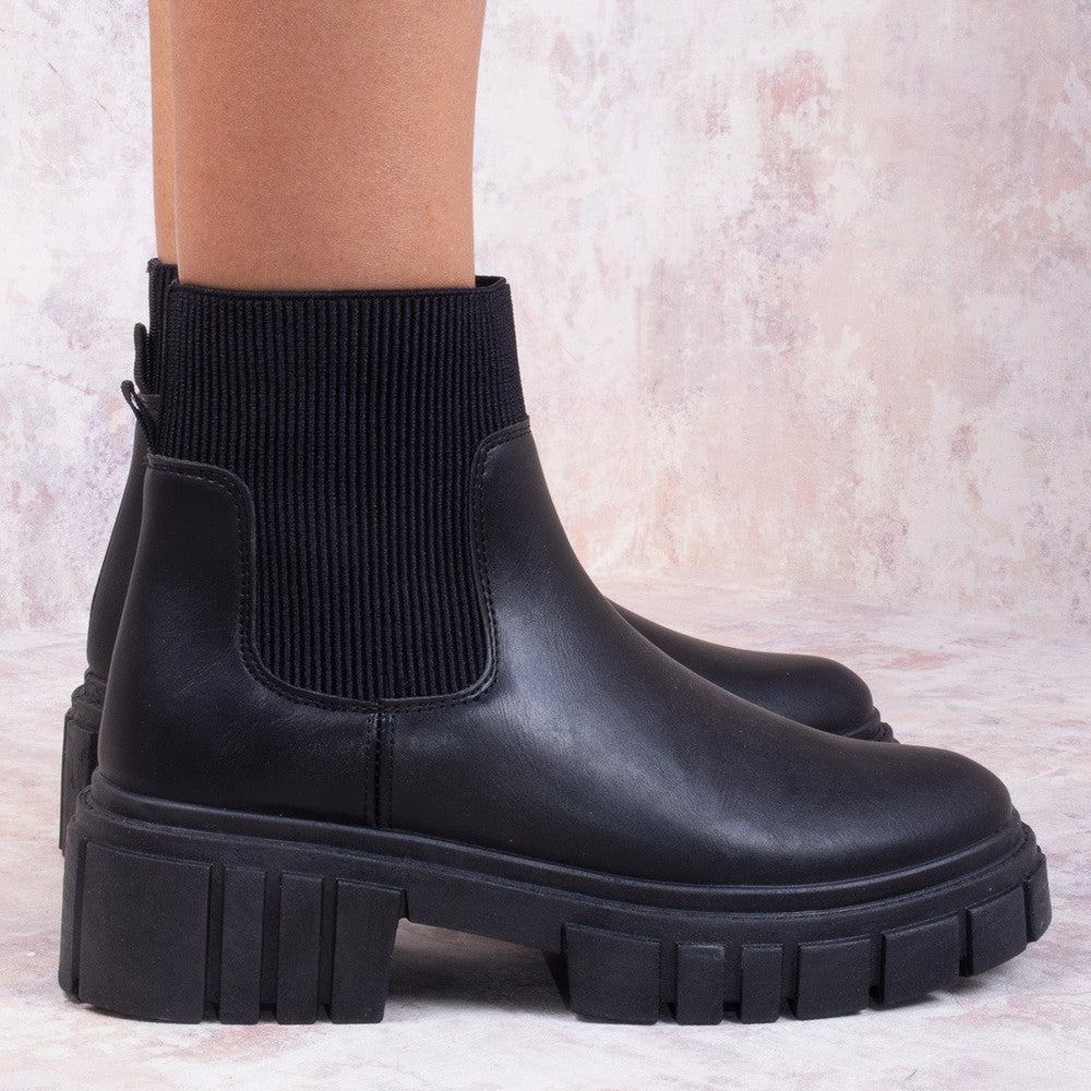 
                      
                        Black Platform Slip On Faux Leather Sock Boot
                      
                    