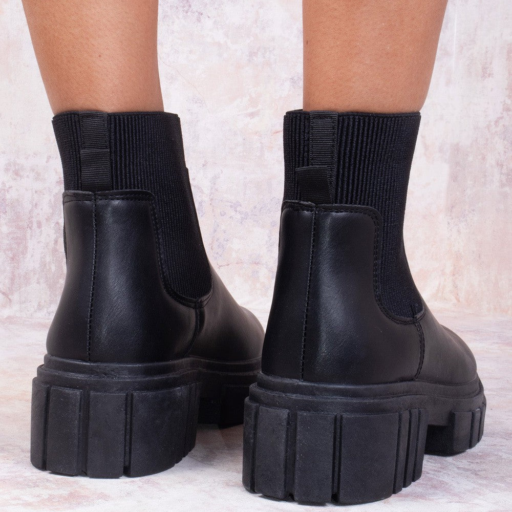 
                      
                        Black Platform Slip On Faux Leather Sock Boot
                      
                    