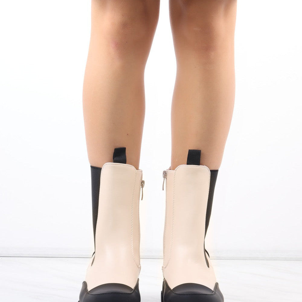 
                      
                        Cream/Black Calf Length Chunky Faux Leather Chelsea Boots
                      
                    