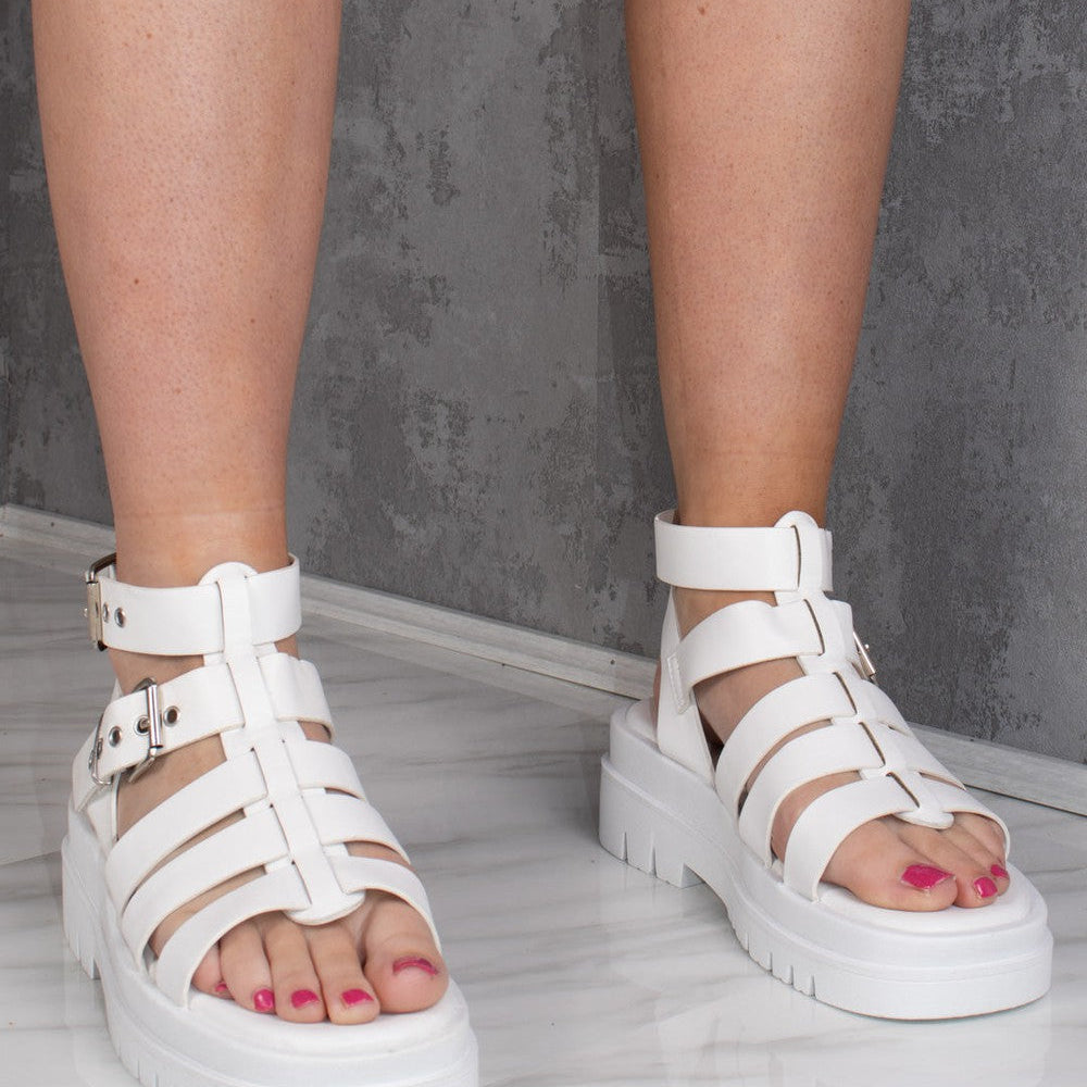 
                      
                        White Chunky Platform Caged Gladiator Sandal
                      
                    