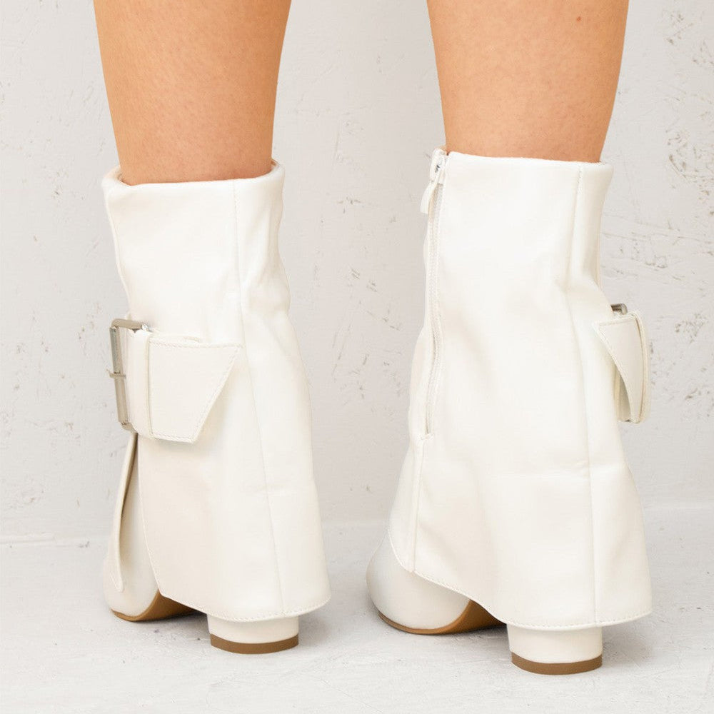 
                      
                        White Leather Fold Over Buckle Strap Design Shark Ankle Boot
                      
                    