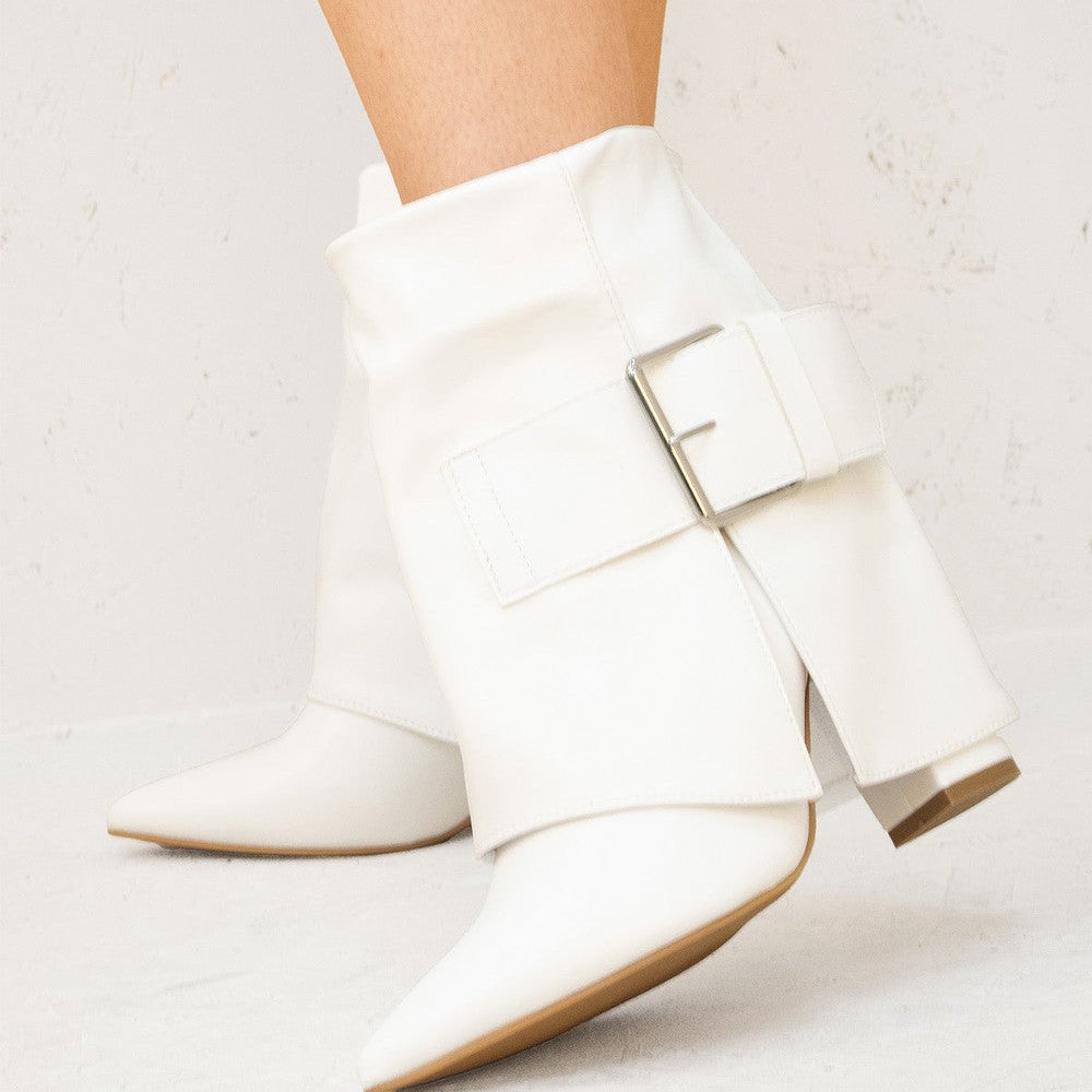 
                      
                        White Leather Fold Over Buckle Strap Design Shark Ankle Boot
                      
                    