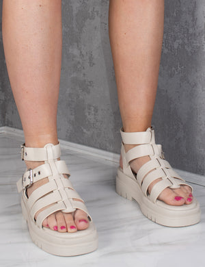 
            
                Load image into Gallery viewer, Beige Chunky Platform Caged Gladiator Sandal
            
        
