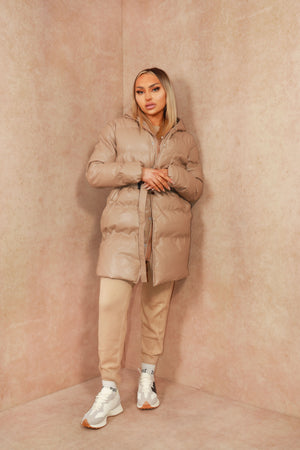 
            
                Load image into Gallery viewer, Beige Faux Leather Tie Oversized Midi Length Puffer Jacket
            
        
