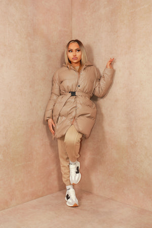 
            
                Load image into Gallery viewer, Beige Faux Leather Tie Oversized Midi Length Puffer Jacket
            
        