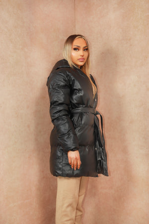 
            
                Load image into Gallery viewer, Black Faux Leather Tie Oversized Midi Length Puffer Jacket
            
        